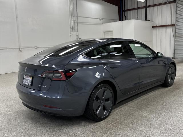 used 2022 Tesla Model 3 car, priced at $28,497