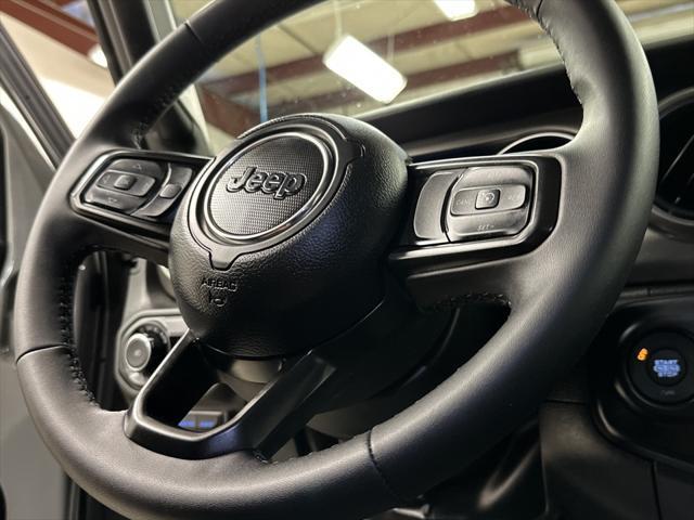 used 2023 Jeep Wrangler 4xe car, priced at $33,497