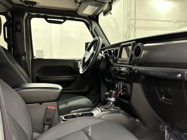 used 2023 Jeep Wrangler 4xe car, priced at $33,497