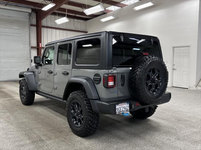 used 2023 Jeep Wrangler 4xe car, priced at $33,497