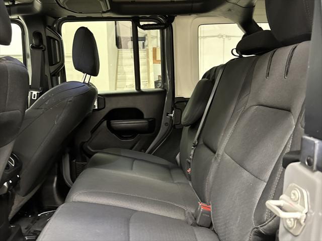 used 2023 Jeep Wrangler 4xe car, priced at $33,497