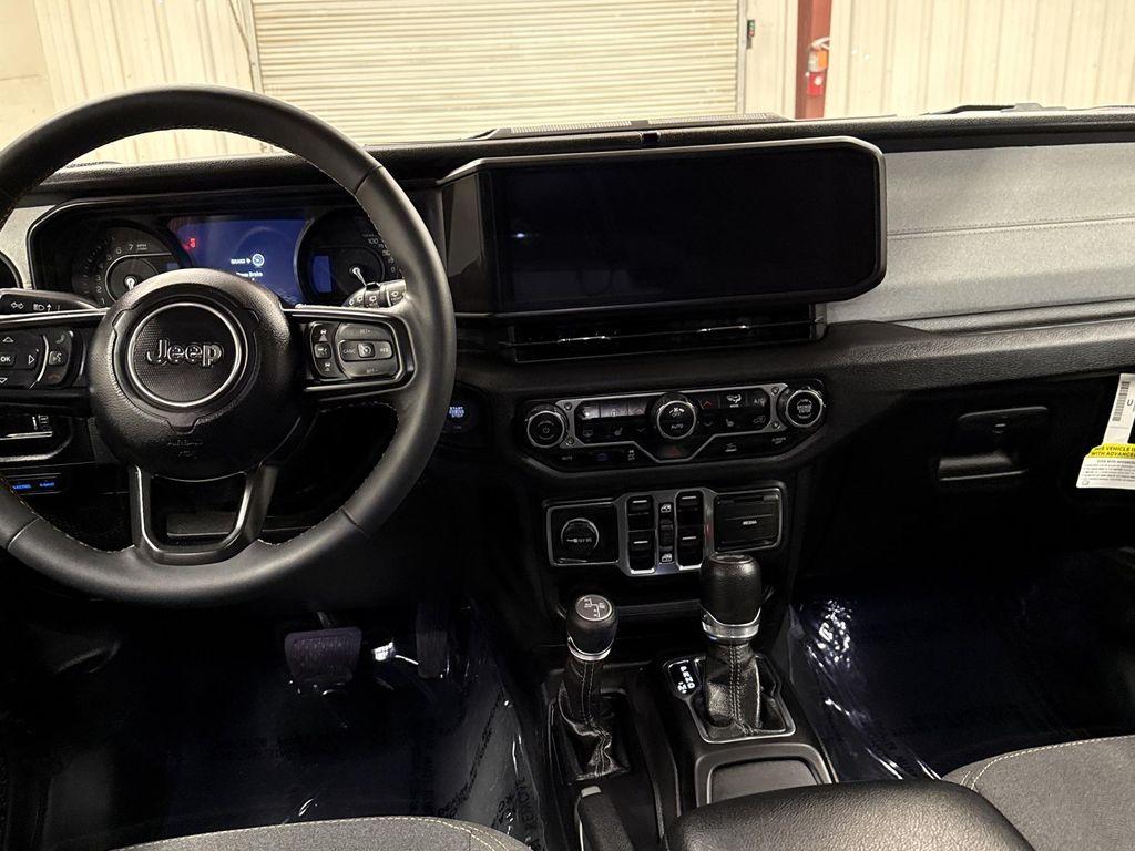 used 2024 Jeep Wrangler 4xe car, priced at $32,497