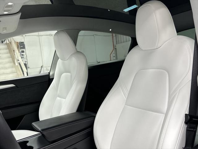 used 2023 Tesla Model Y car, priced at $34,497