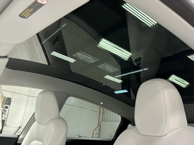 used 2023 Tesla Model Y car, priced at $34,497