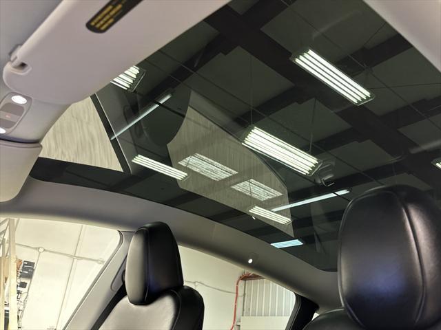 used 2024 Tesla Model Y car, priced at $38,997