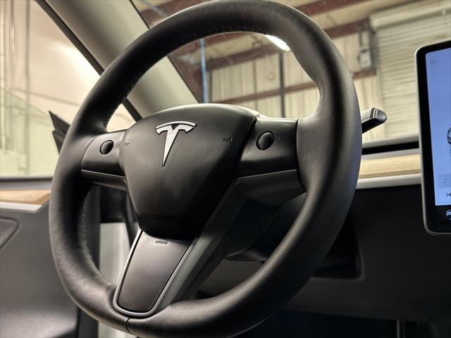 used 2024 Tesla Model Y car, priced at $36,497