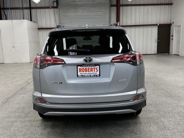 used 2018 Toyota RAV4 car, priced at $22,997