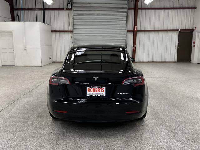 used 2023 Tesla Model 3 car, priced at $31,997