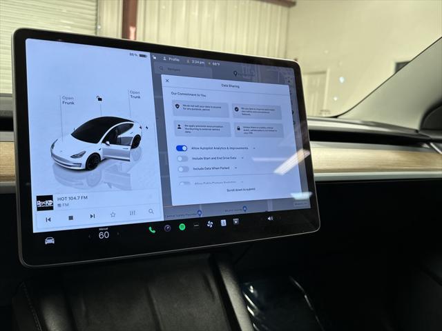 used 2023 Tesla Model 3 car, priced at $33,997