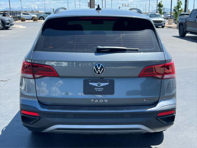 used 2022 Volkswagen Taos car, priced at $16,999