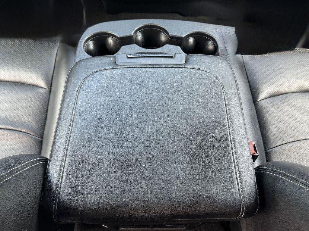 used 2018 Ram 1500 car, priced at $21,646