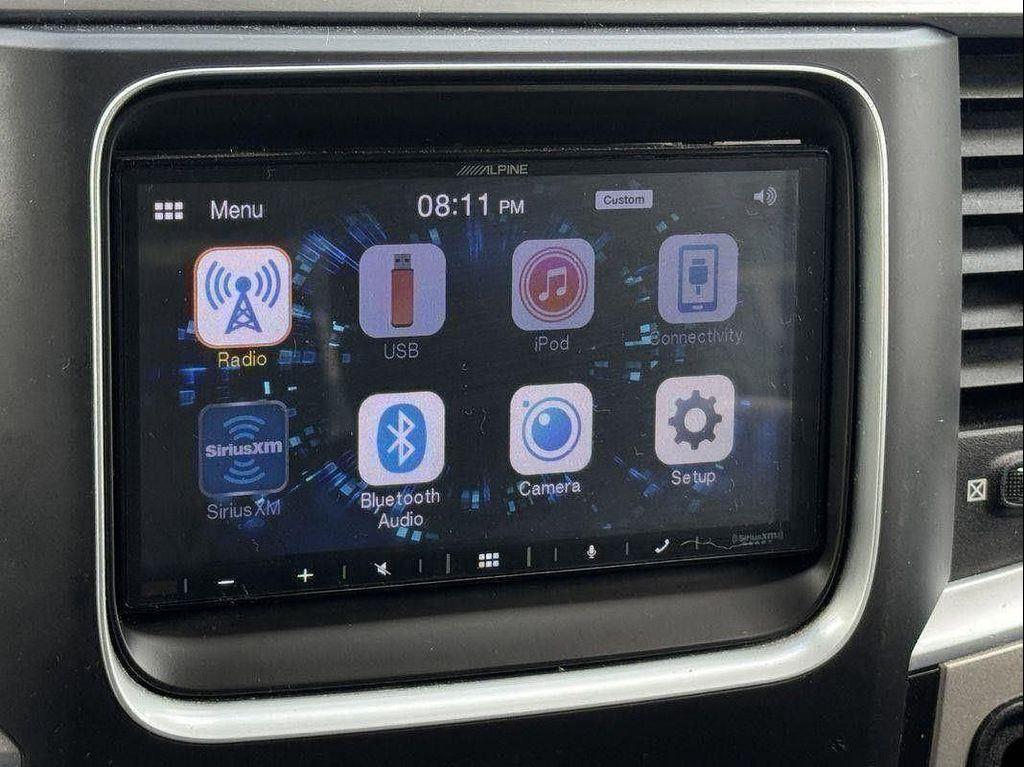 used 2018 Ram 1500 car, priced at $21,646