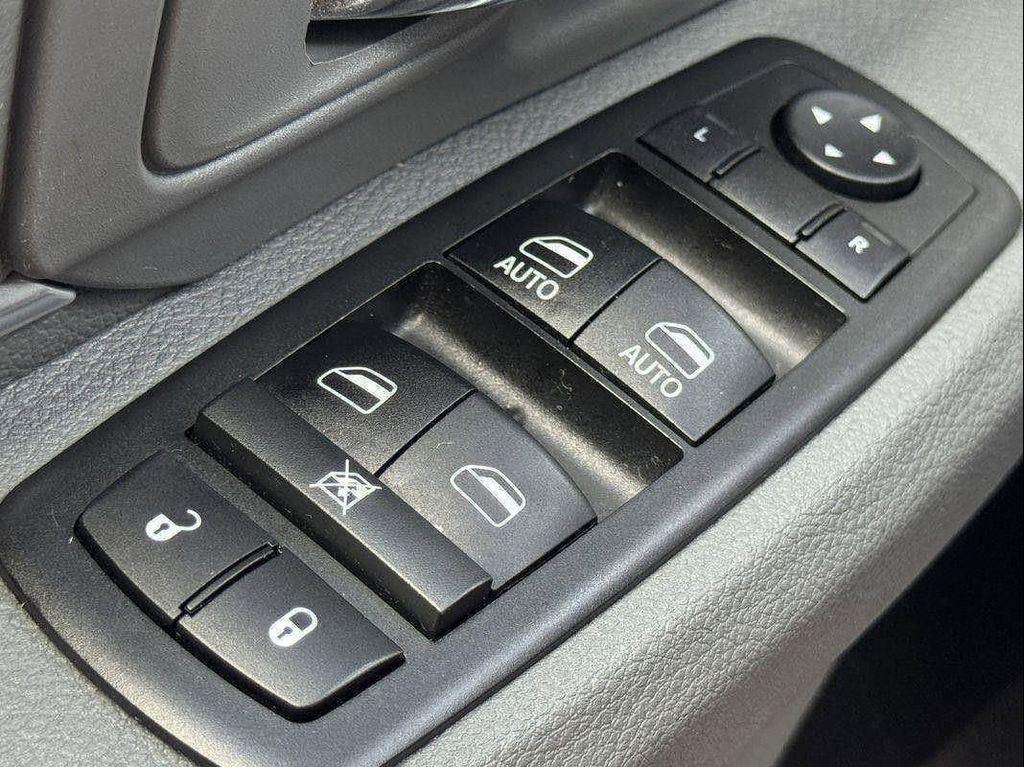 used 2018 Ram 1500 car, priced at $21,646