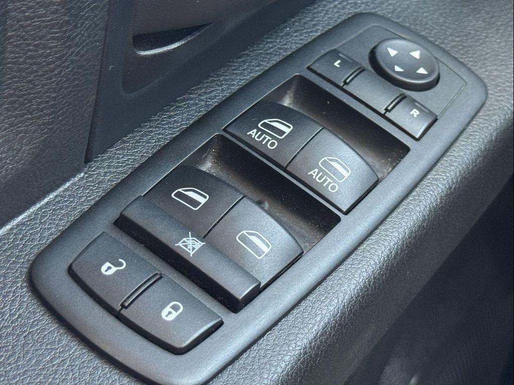 used 2014 Ram 1500 car, priced at $22,988