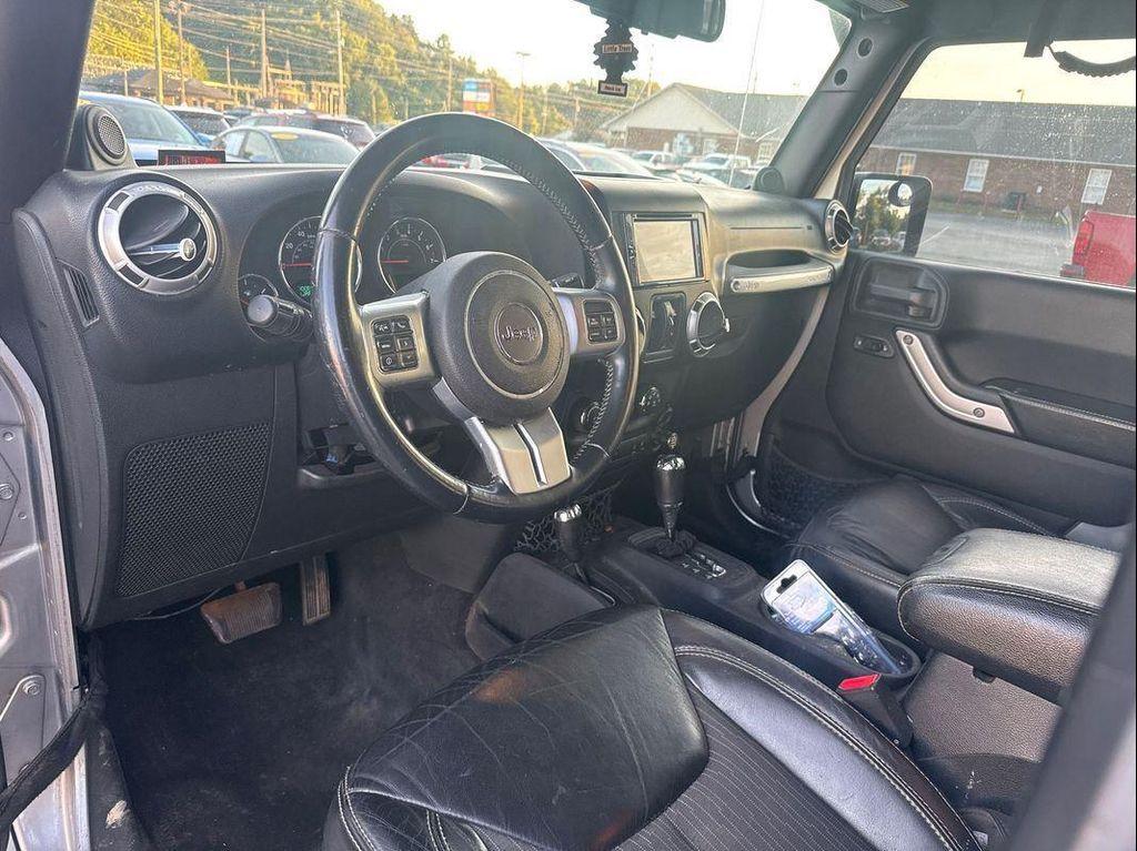 used 2013 Jeep Wrangler Unlimited car, priced at $16,449