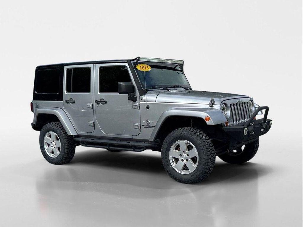 used 2013 Jeep Wrangler Unlimited car, priced at $16,449