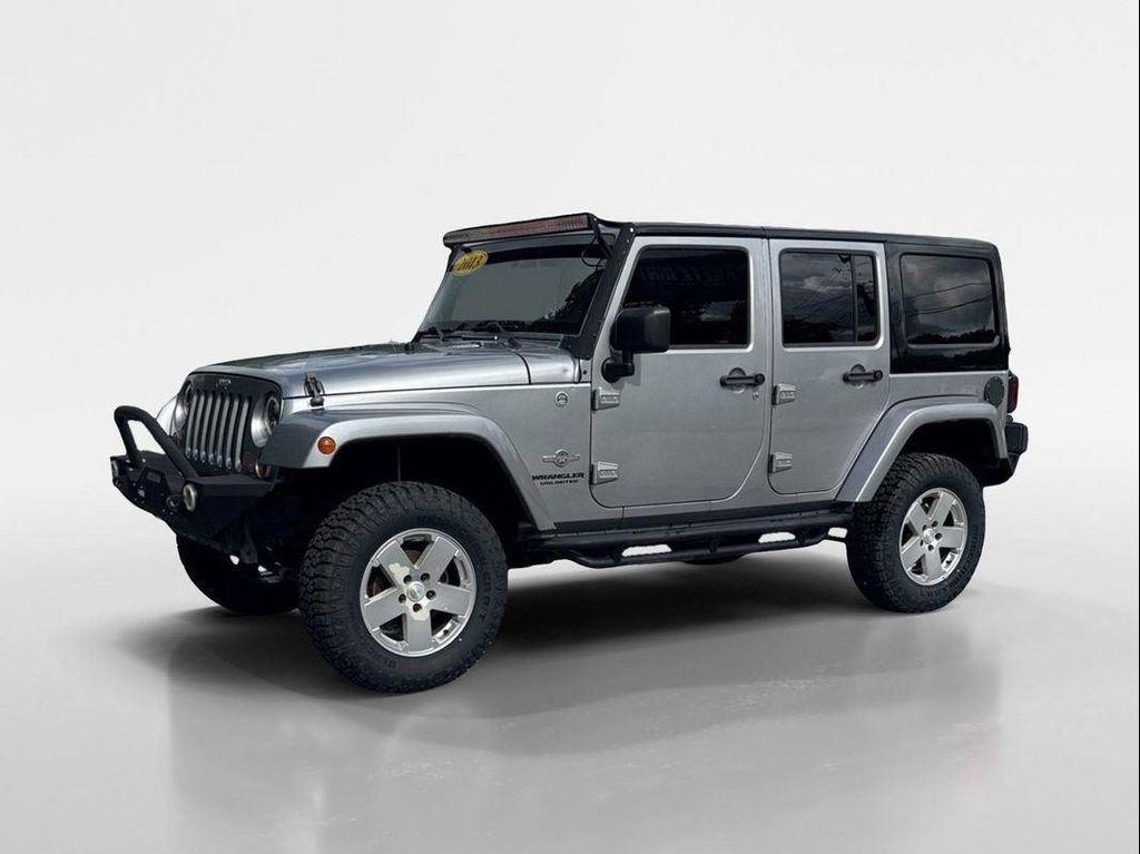 used 2013 Jeep Wrangler Unlimited car, priced at $16,449