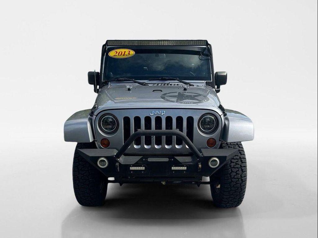 used 2013 Jeep Wrangler Unlimited car, priced at $16,449
