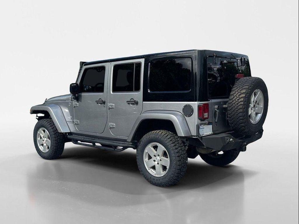 used 2013 Jeep Wrangler Unlimited car, priced at $16,449