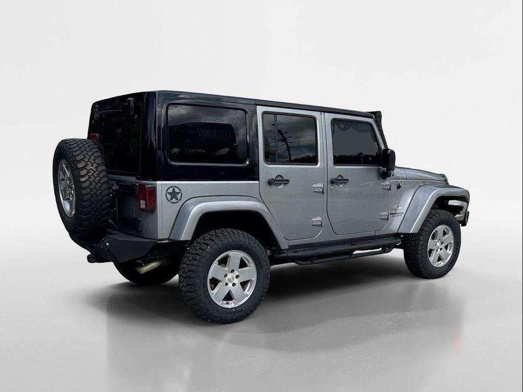 used 2013 Jeep Wrangler Unlimited car, priced at $16,449