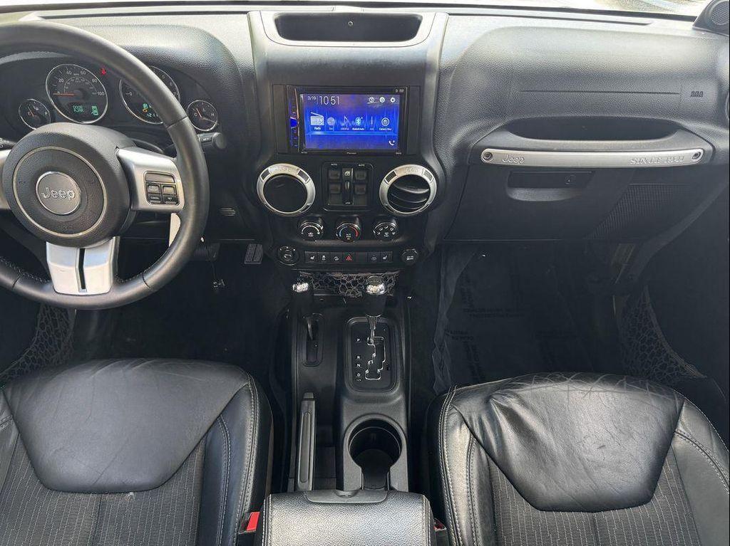 used 2013 Jeep Wrangler Unlimited car, priced at $16,449