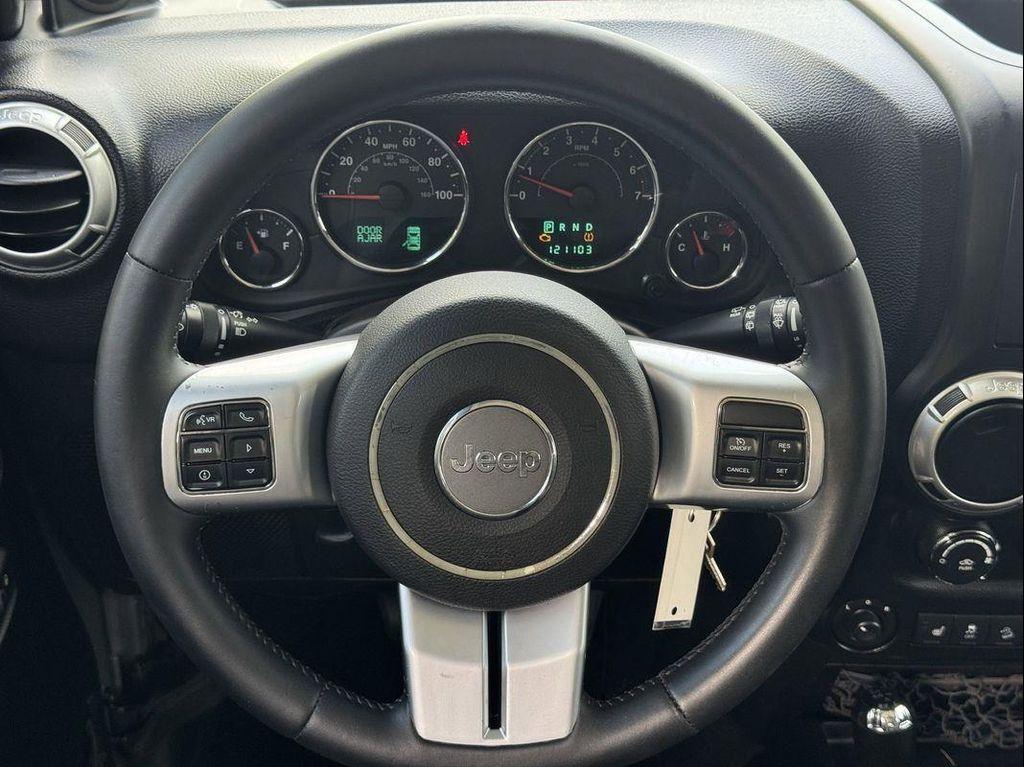 used 2013 Jeep Wrangler Unlimited car, priced at $16,449
