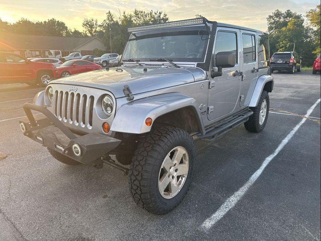 used 2013 Jeep Wrangler Unlimited car, priced at $16,449