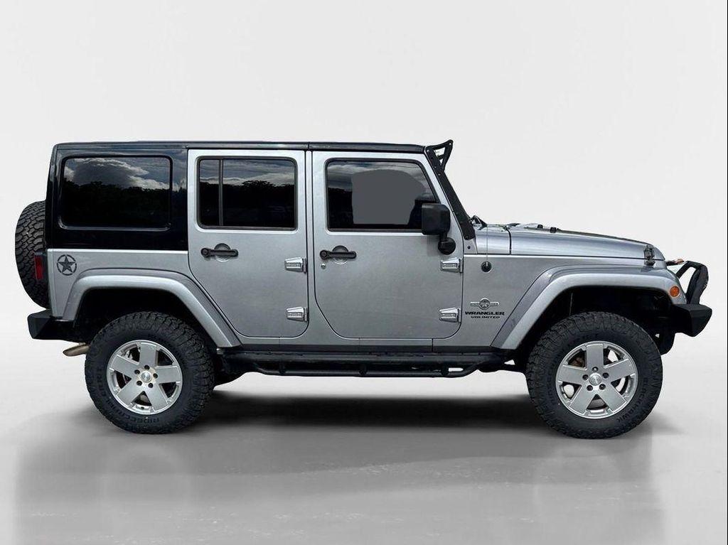 used 2013 Jeep Wrangler Unlimited car, priced at $16,449