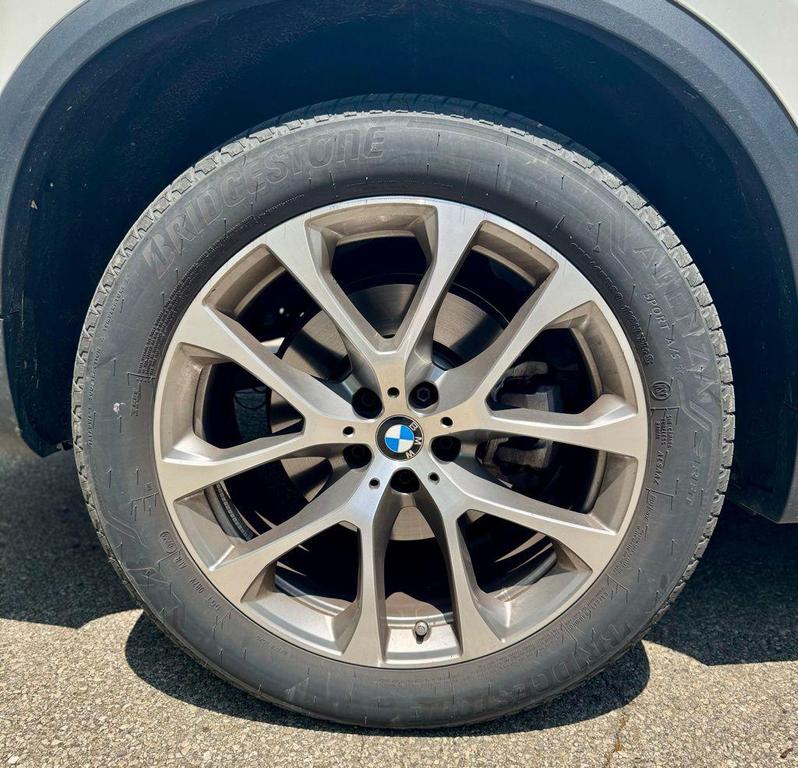 used 2024 BMW X5 car, priced at $67,000