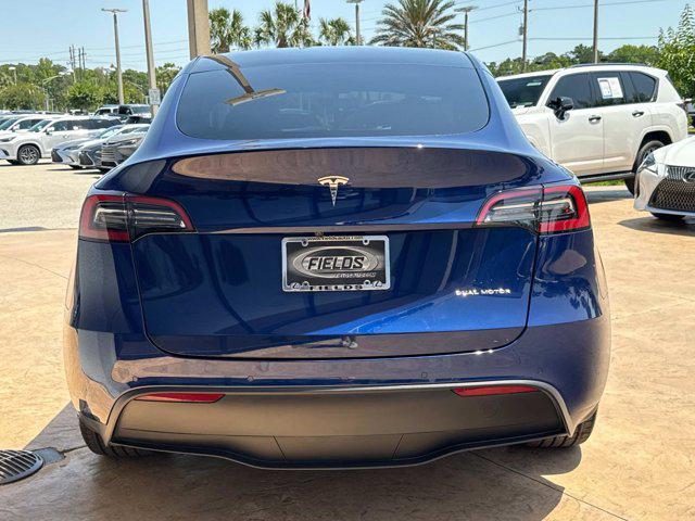 used 2022 Tesla Model Y car, priced at $28,520