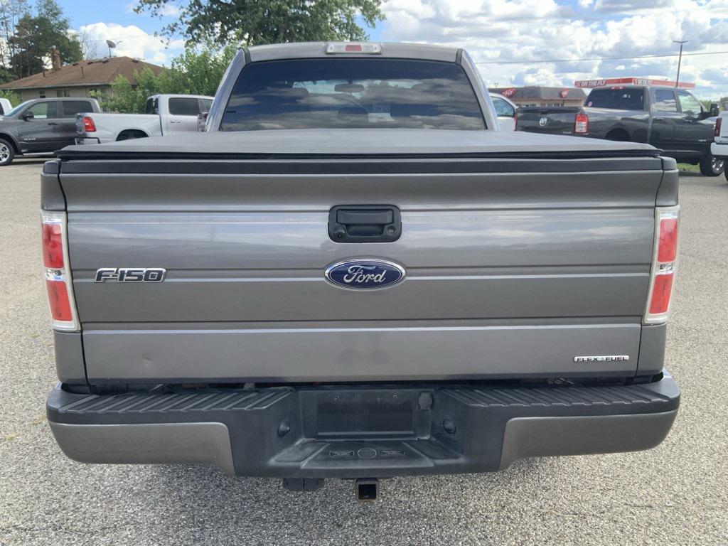 used 2014 Ford F-150 car, priced at $14,000