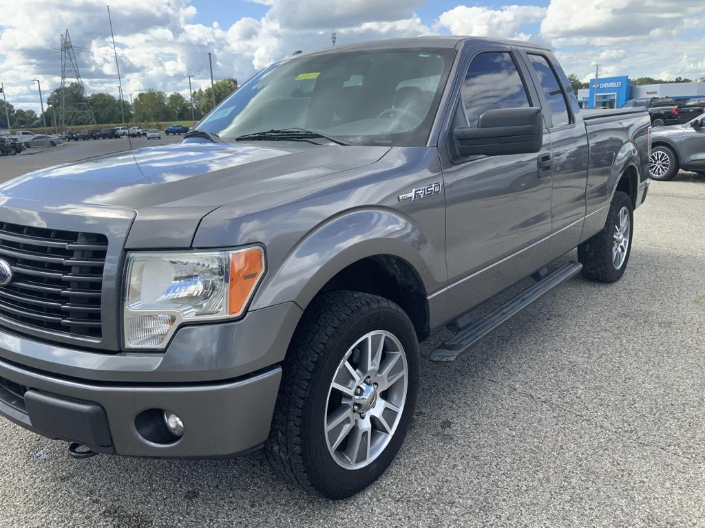 used 2014 Ford F-150 car, priced at $14,000