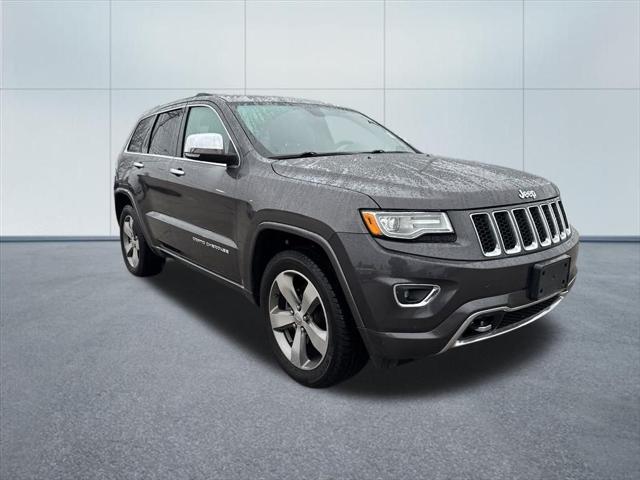 used 2014 Jeep Grand Cherokee car, priced at $13,038