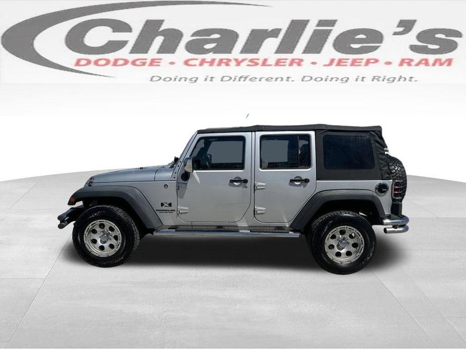 used 2009 Jeep Wrangler Unlimited car, priced at $15,283