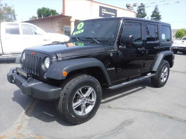 used 2014 Jeep Wrangler Unlimited car, priced at $17,688