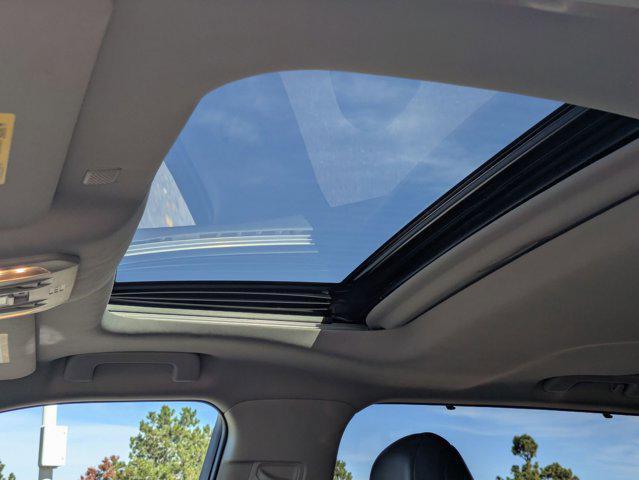 used 2021 Toyota Highlander Hybrid car, priced at $35,998