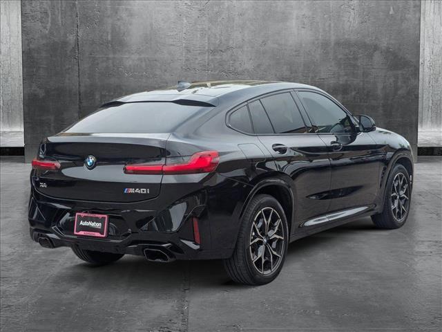 used 2025 BMW X4 car, priced at $65,999