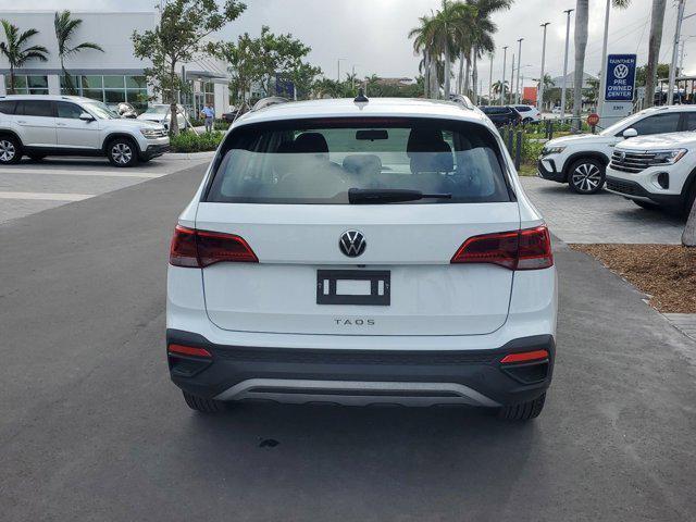 used 2022 Volkswagen Taos car, priced at $18,595