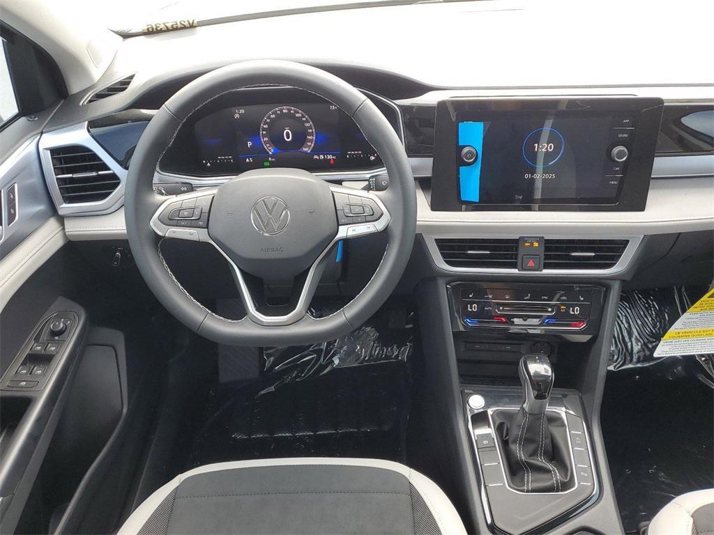 new 2025 Volkswagen Taos car, priced at $26,028