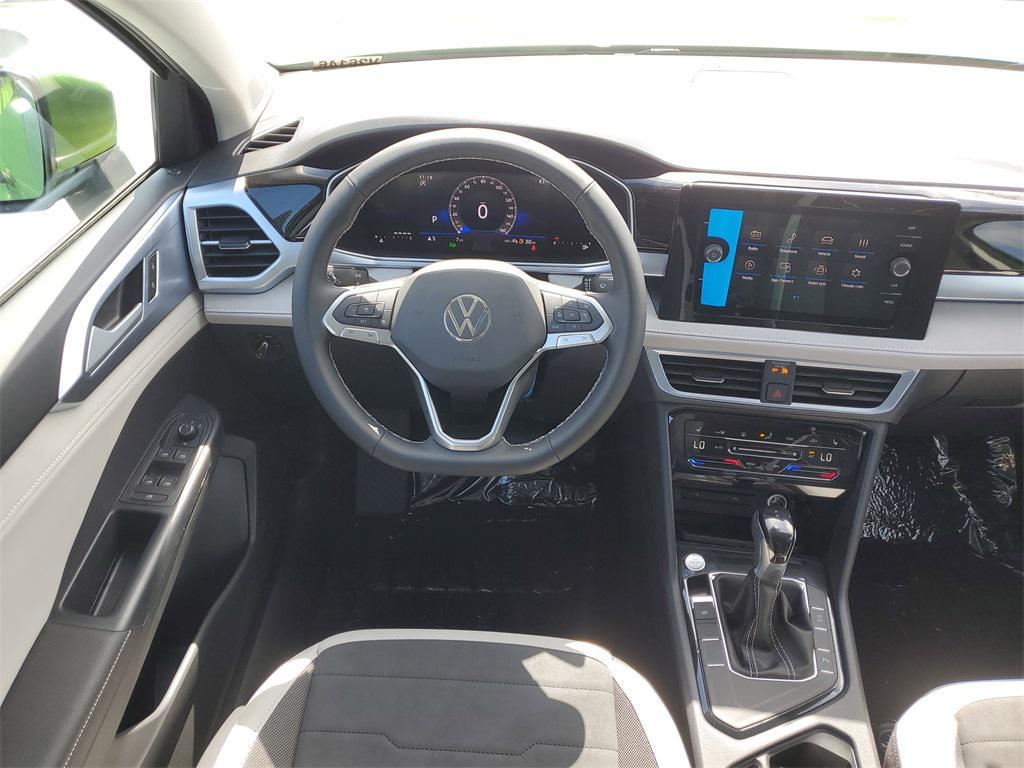 new 2025 Volkswagen Taos car, priced at $26,201