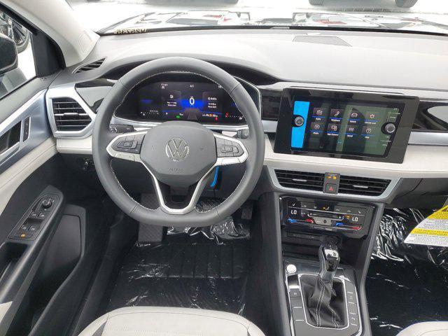 new 2025 Volkswagen Taos car, priced at $30,028