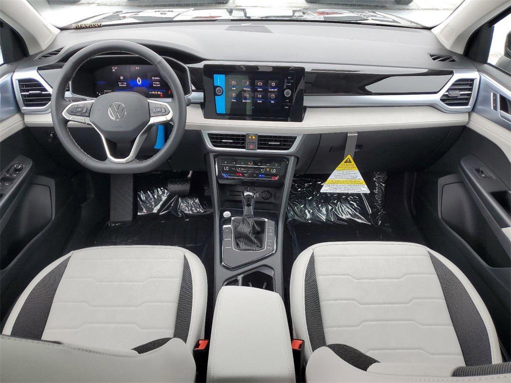 new 2025 Volkswagen Taos car, priced at $28,028
