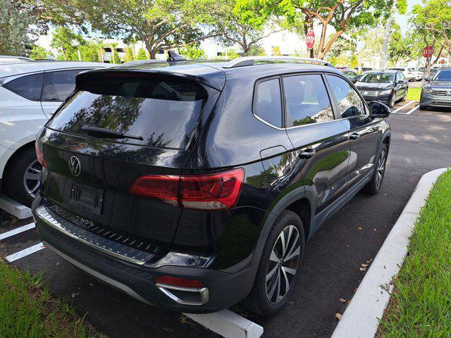 used 2022 Volkswagen Taos car, priced at $18,595