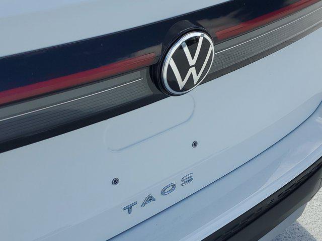 new 2025 Volkswagen Taos car, priced at $31,221