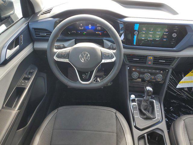 used 2024 Volkswagen Taos car, priced at $30,303