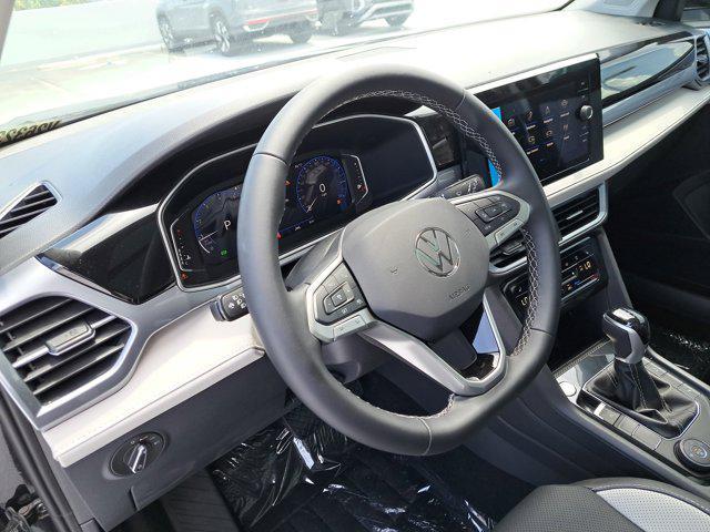 new 2025 Volkswagen Taos car, priced at $35,579