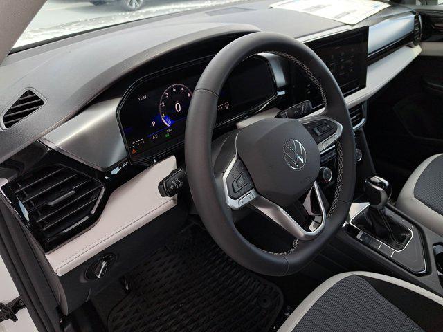 new 2025 Volkswagen Taos car, priced at $27,216
