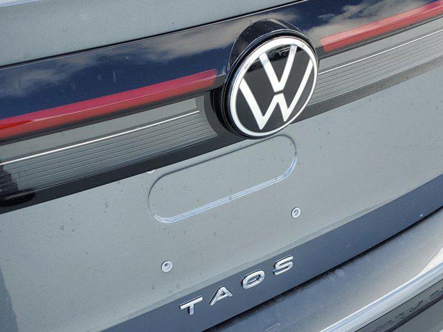 new 2025 Volkswagen Taos car, priced at $30,021