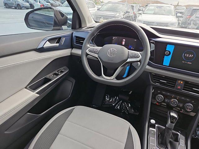 used 2024 Volkswagen Taos car, priced at $31,631