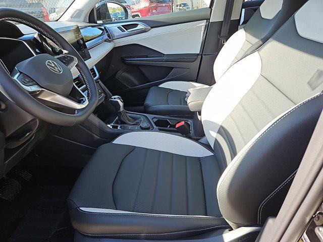 new 2025 Volkswagen Taos car, priced at $35,056